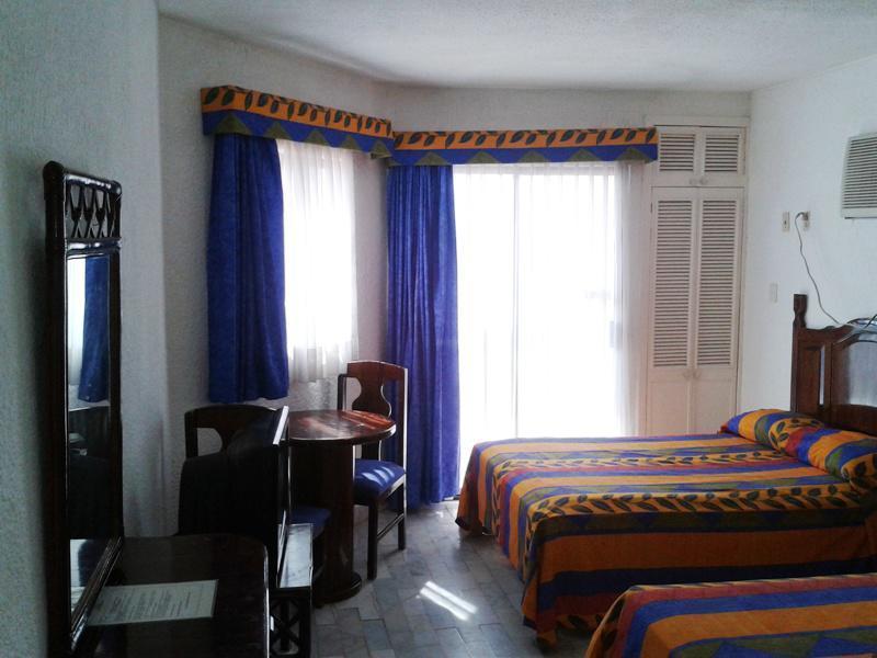 Las Perlas Condos Канкун Стая снимка